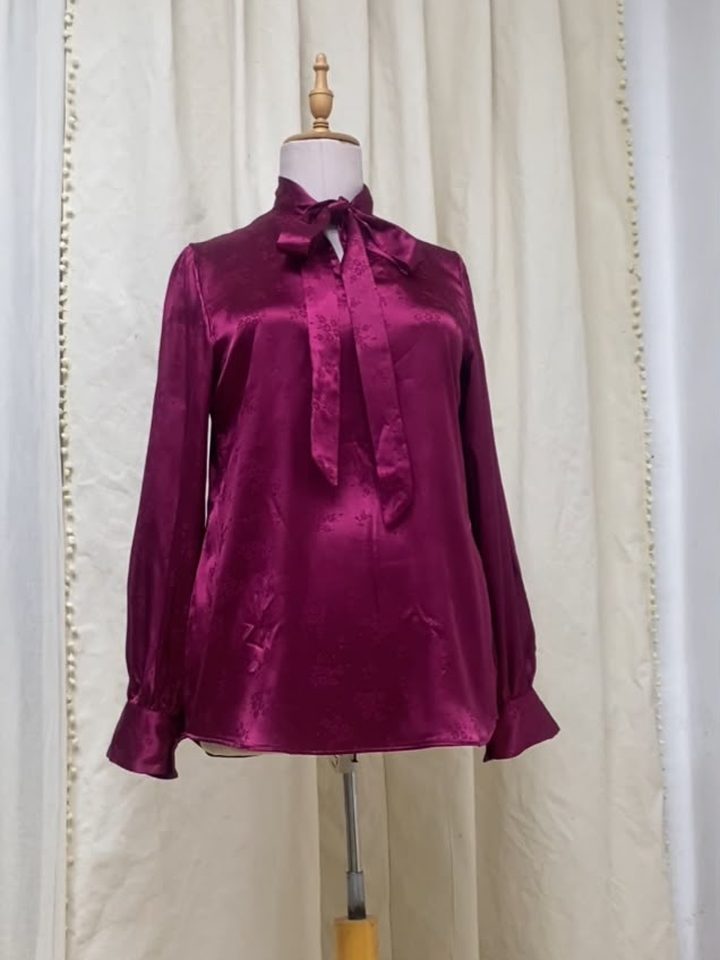 Plum satin blouse with a tie neck