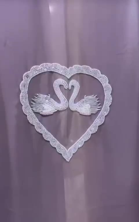 Lilac abaya with swan detail in the workshop